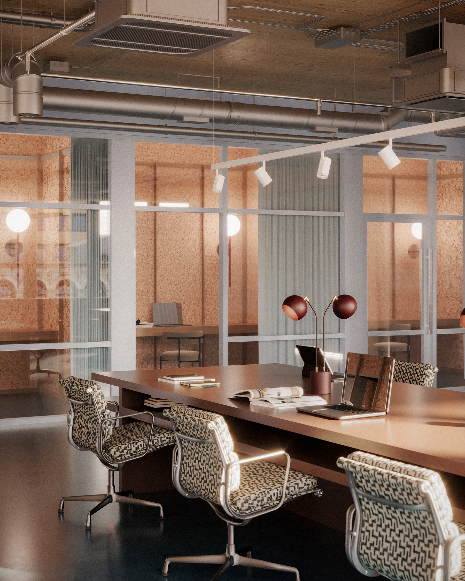 Shared workspace with timber desks, patterned task chairs, glazed focus booths and exposed building services.